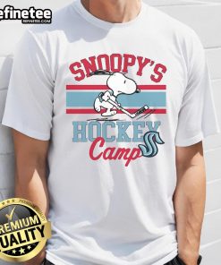 Alt Text: Cute Snoopy Seattle Kraken T-Shirt featuring Snoopy at Hockey Camp, celebrating NHL teams with a fun design.