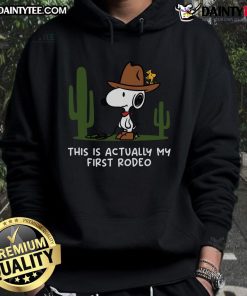 Cute Snoopy hoodie with 'This Is Actually My First Rodeo' text, perfect for fans of Snoopy and casual wear.