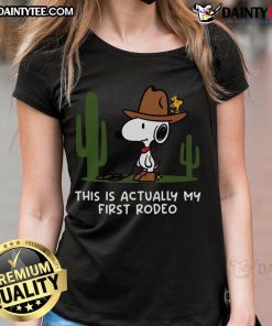 Cute Snoopy 'This Is Actually My First Rodeo' ladies tee featuring a playful design and vibrant colors.
