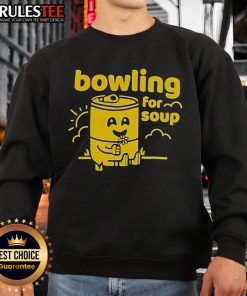 Cute sparrow sleeps on a cozy Bowling for Soup sweatshirt, showcasing its adorable design and comfort.