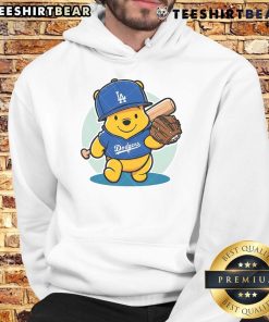 Alt Text: Cute Winnie the Pooh wearing a LA Dodgers baseball hoodie, perfect for fans of Disney and MLB apparel.