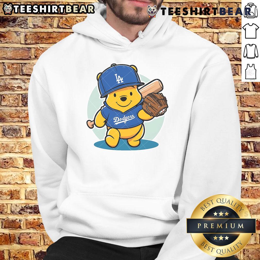 Cute Winnie The Pooh La Dodgers Pooh Dodgers Baseball Hoodie Alt Text: Cute Winnie the Pooh wearing a LA Dodgers baseball hoodie, perfect for fans of Disney and MLB apparel.