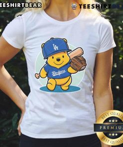 Cute Winnie the Pooh LA Dodgers baseball ladies tee featuring playful design and team colors for fans.