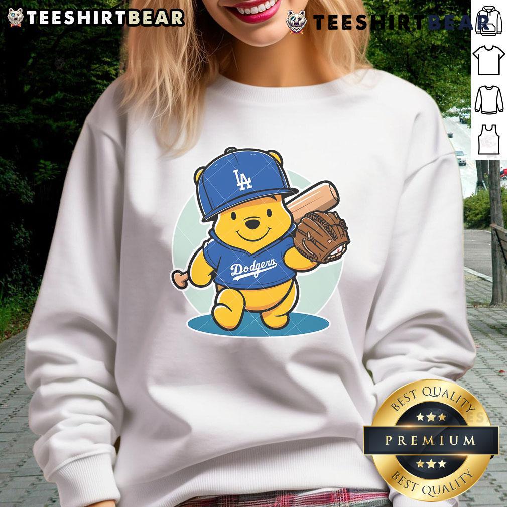 Cute Winnie The Pooh La Dodgers Pooh Dodgers Baseball Sweatshirt Alt Text: Adorable Winnie the Pooh sweatshirt featuring LA Dodgers logo, perfect for baseball fans and cozy wear.