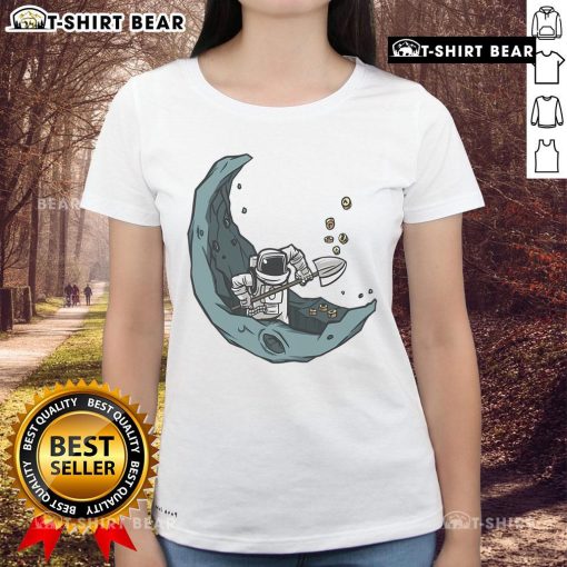 Funny astronaut mining coins on the moon graphic for ladies' tee, perfect for space lovers and humor enthusiasts.