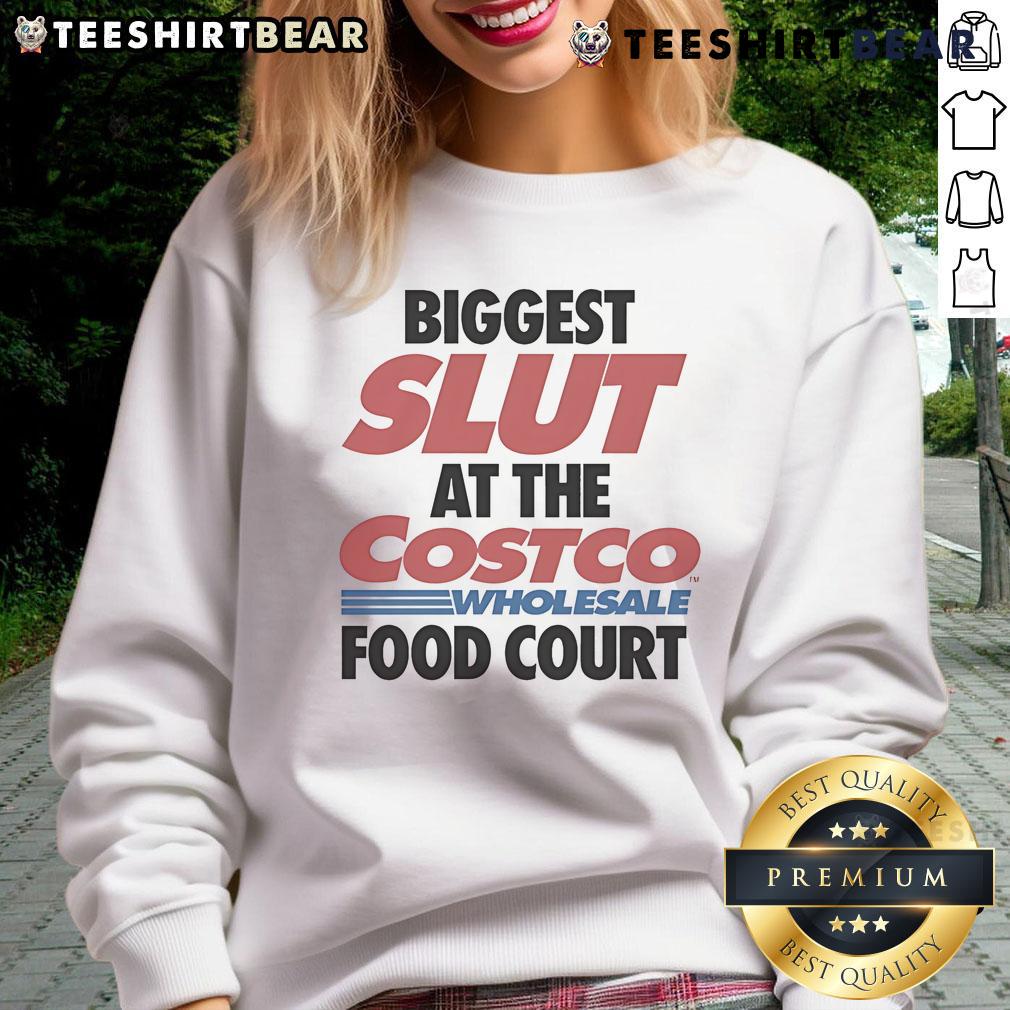 Funny Biggest Slut At The Costco Wholesale Food Court Sweatshirt Funny sweatshirt reading 'Biggest Slut at the Costco Wholesale Food Court' displayed on a model at a food court.