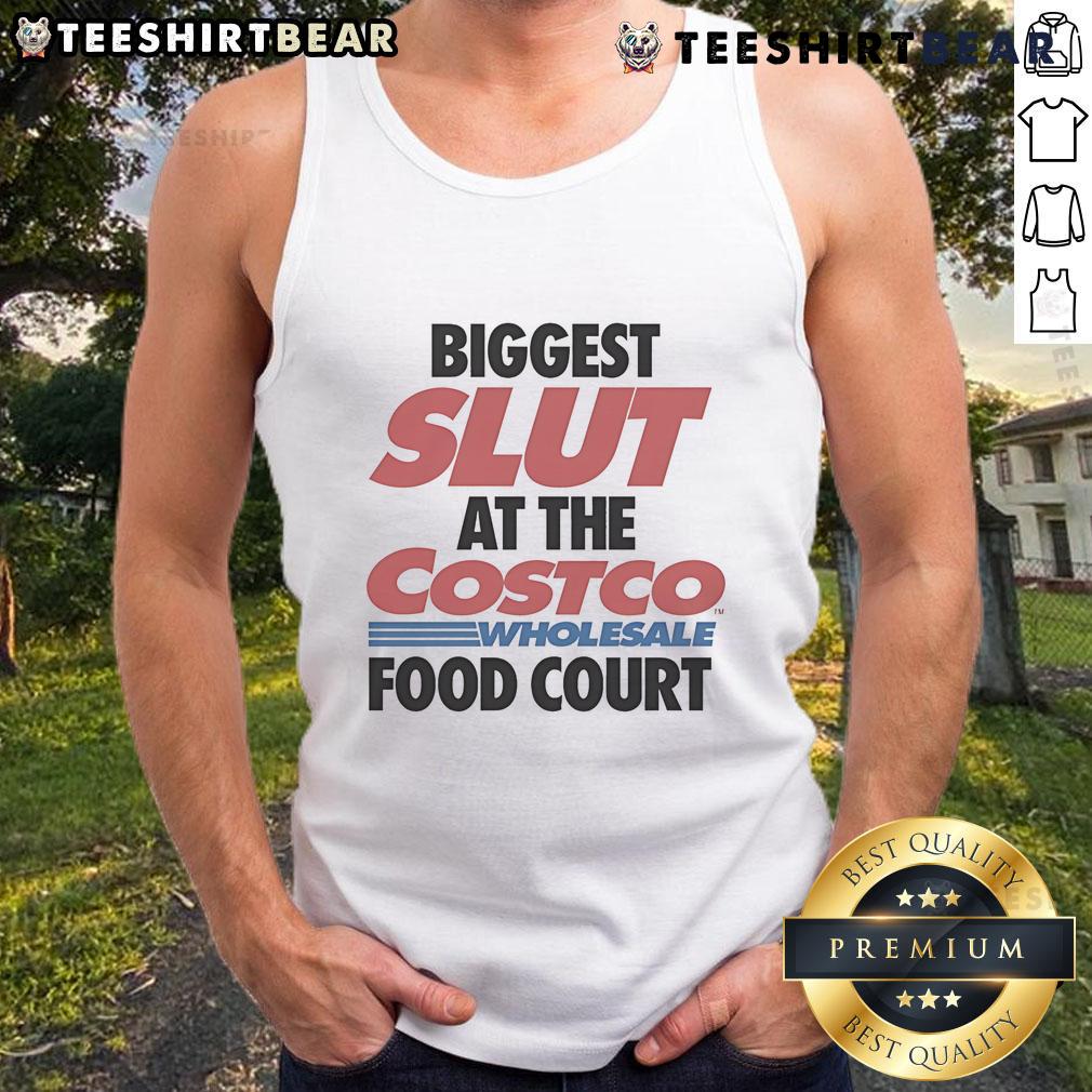 Funny Biggest Slut At The Costco Wholesale Food Court Tank Top Funny tank top reading 'Biggest Slut at the Costco Wholesale Food Court' worn by a woman in a lively food court setting.