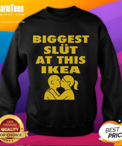 Alt Text: Funny 'Biggest Slut at This Furniture Store' sweatshirt displayed on a model, showcasing humor and unique style.