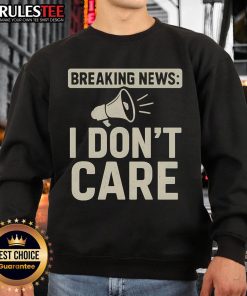 Funny Breaking News I Don't Care sweatshirt design with bold text, perfect for casual wear and humor lovers.