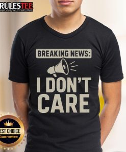 Alt Text: Funny Breaking News I Don't Care T-Shirt featuring bold text design, perfect for casual wear and humor lovers.