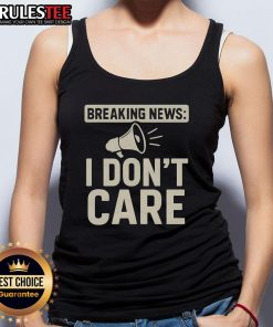 Funny Breaking News I Don't Care Tank Top design featuring bold text and a humorous graphic, perfect for casual wear.