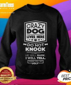 Cozy sweatshirt reading 'Funny Crazy Dog Lives Here, Do Not Knock' ideal for dog lovers and pet owners.