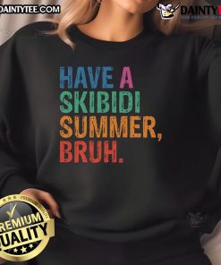 Alt Text: Funny teacher wearing a 'Have A Skibidi Summer Bruh' sweatshirt on the last day of school, celebrating summer vibes.