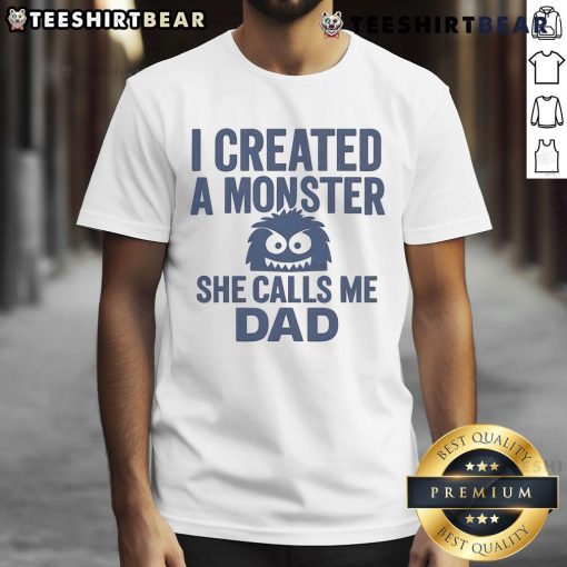 Funny 'I Created A Monster She Calls Me Dad' T-shirt featuring playful graphics, perfect for dads with a sense of humor.