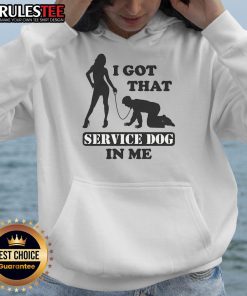 Person wearing a 'Funny I Got That Service Dog In Me' hoodie, showcasing humor and love for service dogs.
