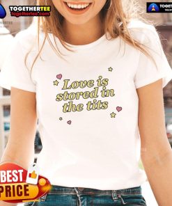 Funny Love Is Stored In The Tits Ladies Tee featuring a humorous graphic design for a playful women's t-shirt.