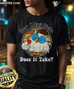 Funny owl graphic on a retro vintage T-shirt asking, 'How many licks does it take?' Perfect for owl lovers and humor fans.