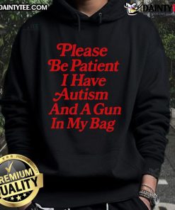 Funny hoodie with text 'Please Be Patient, I Have Autism and a Gun in My Pocket' for autism awareness and humor.