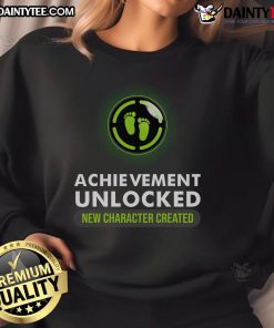 Funny pregnant announcement sweatshirt featuring 'Achievement Unlocked: New Character Created' for gamers.