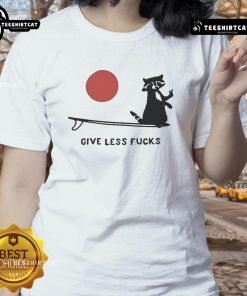Funny raccoon graphic on a 'Give Less Fck' ladies tee, perfect for casual wear and animal lovers.