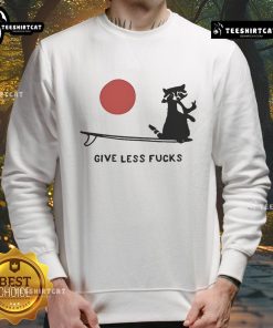 Funny raccoon graphic on a Give Less F*ck sweatshirt, perfect for casual wear and humor lovers.