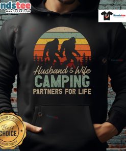 Happy couple wearing 'Good Bigfoot Camping Husband and Wife Partners for Life' hoodie, enjoying nature together.