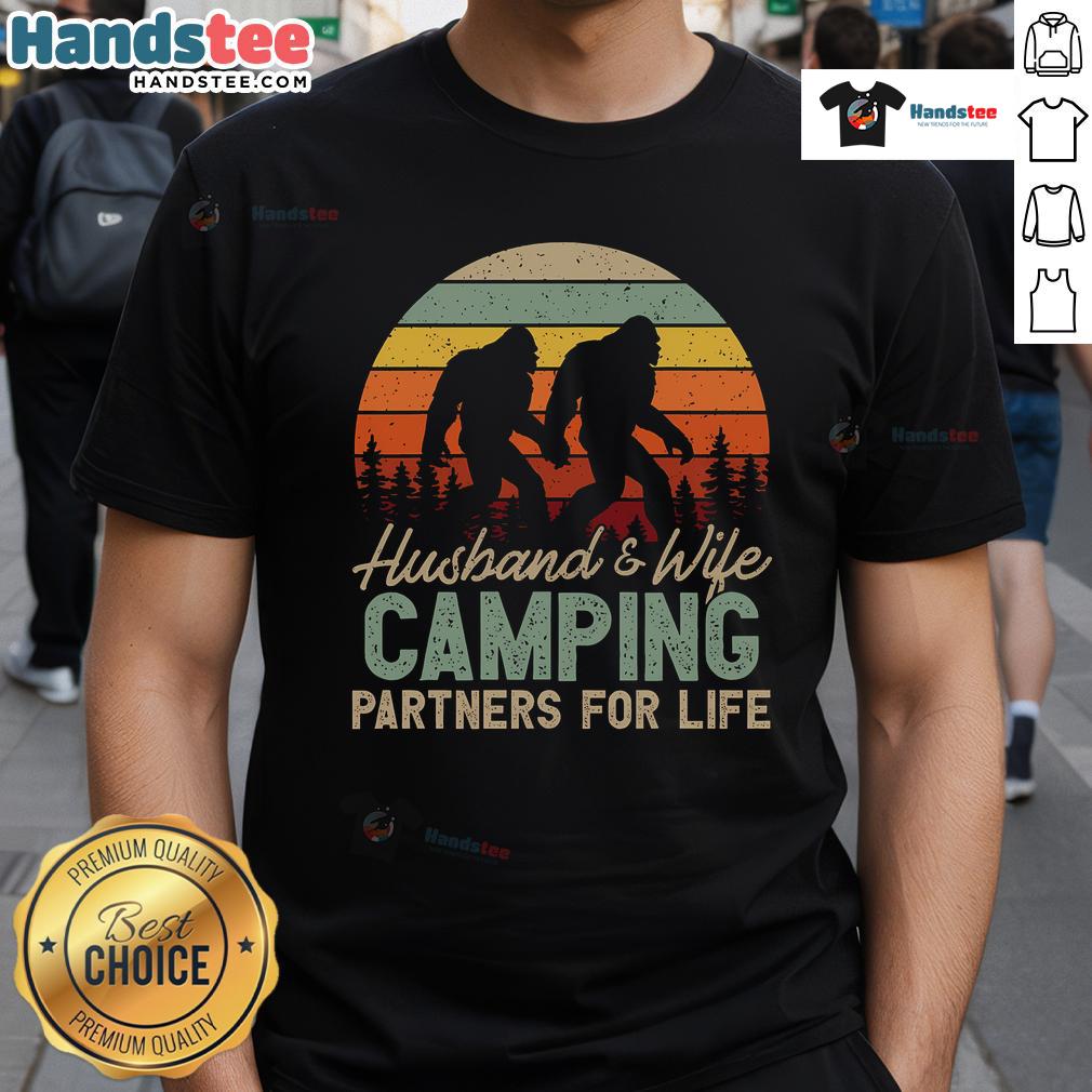 Good Bigfoot Camping Husband And Wife Partners For Life T Shirt Couple wearing 'Good Bigfoot Camping Husband And Wife Partners For Life' T-Shirt, showcasing their love for adventure and Bigfoot.