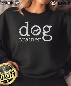 Good Dog Trainer sweatshirt worn by a dog school trainer, showcasing commitment to canine education and training.