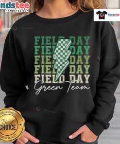 Good Field Day Green Team sweatshirt worn during a fun outdoor team game on a school field trip.