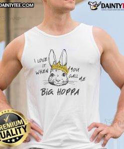 Man wearing a 'Good I Love It When You Call Me Big Hoppa' tank top, showcasing a trendy streetwear style.