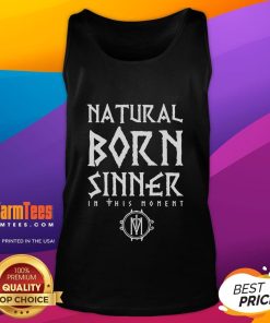 Model wearing a Good In This Moment Natural Born Sinner tank top, featuring a stylish design perfect for casual wear.