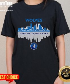 Stylish ladies tee featuring the Minnesota Timberwolves skyline and 'Land of 10,000 Lakes' design for fans.