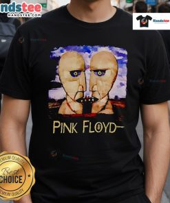 Alt Text: Vintage 90s Pink Floyd T-shirt featuring iconic band graphics and vibrant colors, perfect for music fans and collectors.