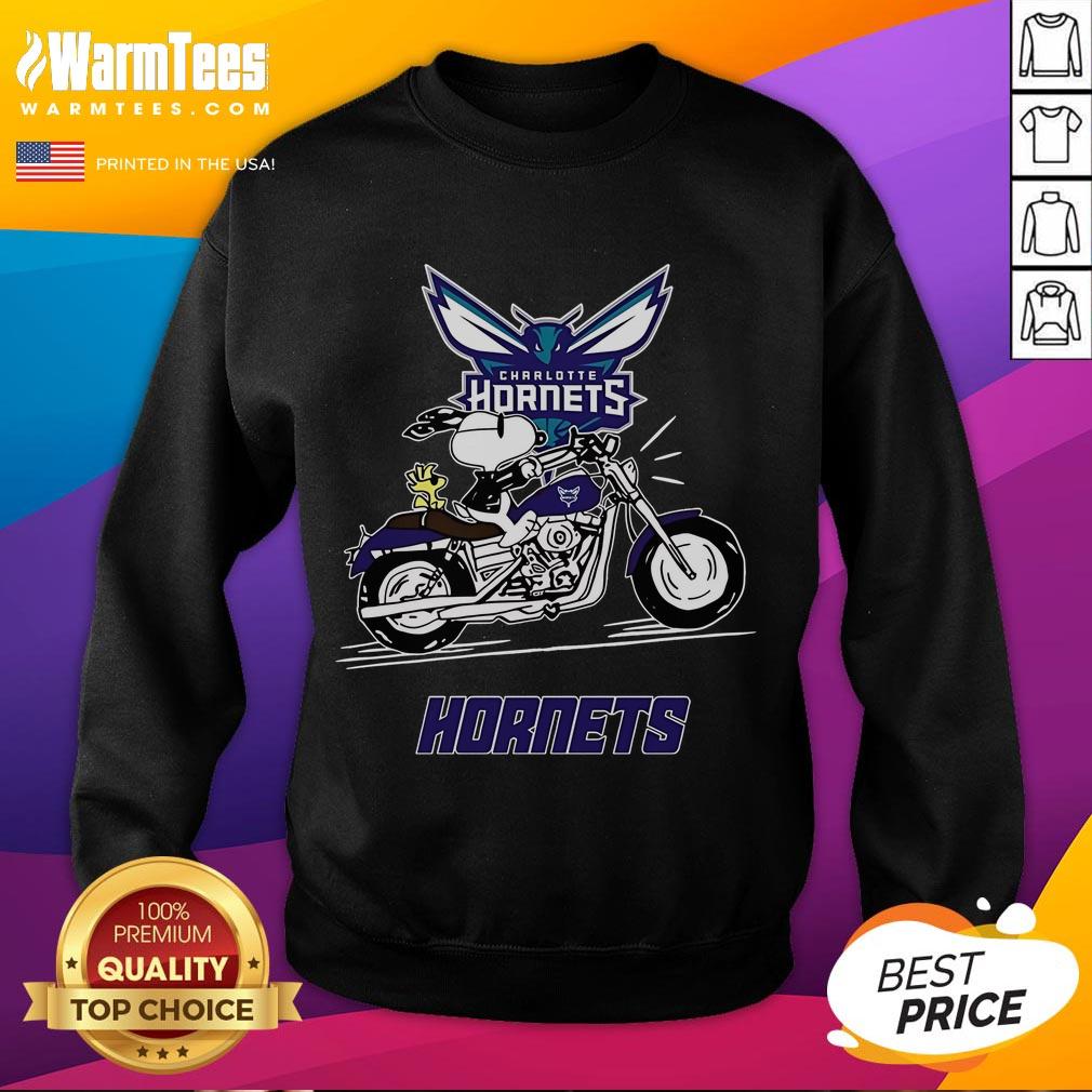 Good Snoopy And Woodstock Driving Motorbike Charlotte Hornets Sweatshirt Good Snoopy and Woodstock driving a motorbike on a Charlotte Hornets sweatshirt, colorful and playful design.