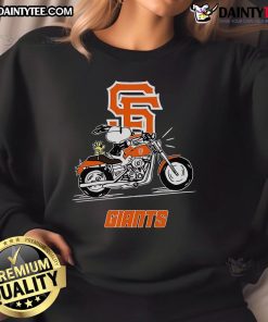 Good Snoopy and Woodstock driving a motorbike, wearing San Francisco Giants sweatshirt, in a playful cartoon scene.