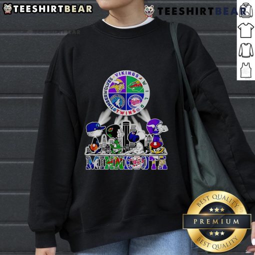 Cozy Good Snoopy sweatshirt featuring Minnesota Twins, Vikings, Wild, and Timberwolves logos, perfect for sports fans.