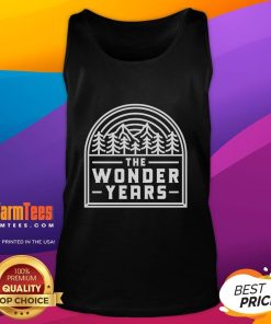 Good The Wonder Years tank top worn in Washington Square Park, showcasing a vibrant forest backdrop.