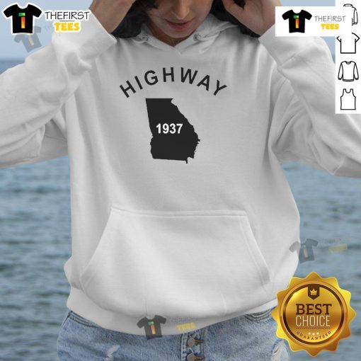 Good Tyrus wearing a vintage 1937 Georgia hoodie on a highway, showcasing retro style and classic fashion.