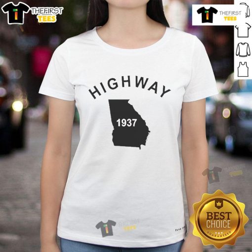 Good Tyrus wearing a vintage Highway 1937 Georgia ladies tee, showcasing retro style and classic Southern charm.