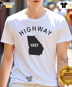 Alt Text: Good Tyrus proudly wearing a vintage Highway 1937 Georgia T-shirt, showcasing unique retro style and Southern charm.