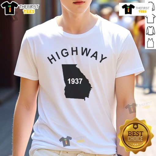 Alt Text: Good Tyrus proudly wearing a vintage Highway 1937 Georgia T-shirt, showcasing unique retro style and Southern charm.