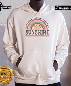 Good Vibe Fun Times Sunshine Hoodie worn by a smiling person on a sunny day, showcasing vibrant tan lines and joyful atmosphere.