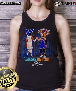 Jalen Brunson wearing a Good Wildcats Villanova tank top at a New York Knicks game, showcasing team spirit and style.