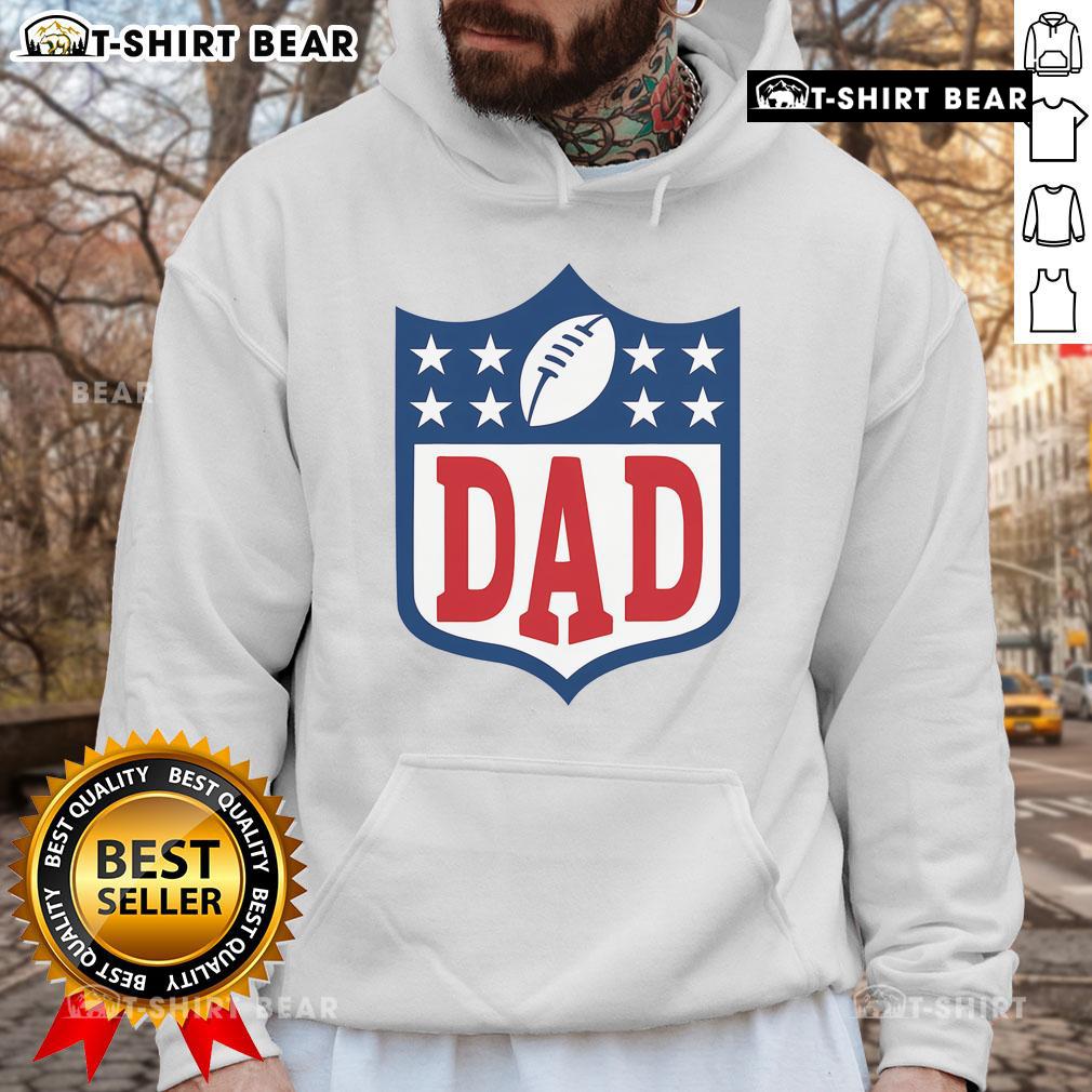 Happy Dad American Football Hoodie Happy dad wearing an American football hoodie, smiling proudly while holding a football in a sunny park.