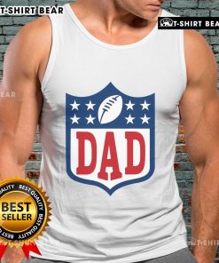 Happy dad wearing an American football tank top, enjoying a sunny day outdoors with friends and family.