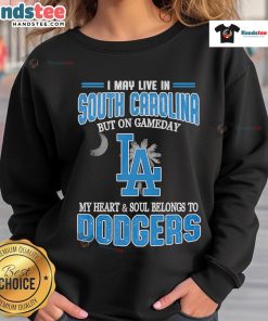 Alt Text: Cozy sweatshirt featuring Happy I May Live in South Carolina But On Gameday My Heart Belongs to Dodgers design.