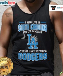 Alt Text: Woman wearing a Dodgers tank top, showcasing pride for the team while living in South Carolina on game day.