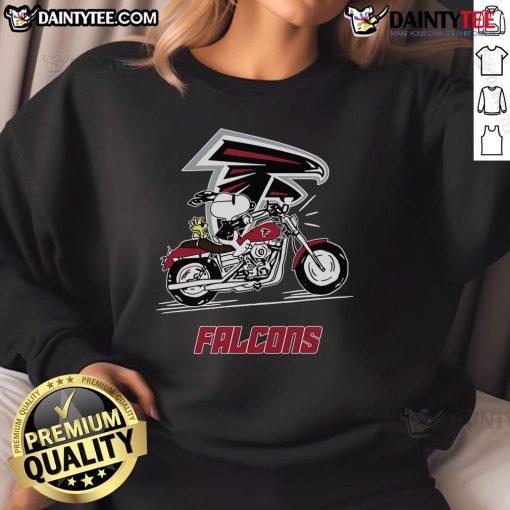 Alt Text: Snoopy and Woodstock joyfully riding a motorbike in an Atlanta Falcons sweatshirt, showcasing their playful spirit.