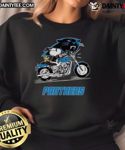 Alt Text: Snoopy and Woodstock happily driving a motorbike while wearing a Carolina Panthers sweatshirt.