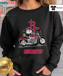 Happy Snoopy and Woodstock driving a motorbike on a Houston Rockets sweatshirt, showcasing vibrant colors and fun design.